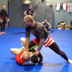 Freedom Jiu Jitsu - Head instructor demonstrating a technique