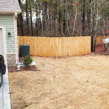 Complete Contractor Services - a yard with a fence and a car - General Contractors Near Me - Pinehurst, North Carolina