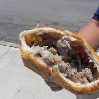 Rokhat Kosher Bakery - a person holding a sandwich - Kosher Near Me - Rego Park, New York Rokhat Kosher Bakery - a person holding a sandwich - Kosher Near Me - Rego Park, New York