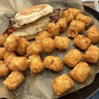 The Pharmacy Burger Parlor - Bacon egg muffin with tots - Sports Bars Near Me - Nashville, Tennessee The Pharmacy Burger Parlor - Bacon egg muffin with tots - Sports Bars Near Me - Nashville, Tennessee