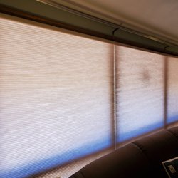 Schneider's Window Coverings - 12 foot long window shade operated via remote control.