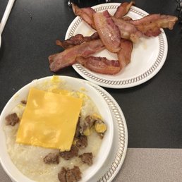 Bowl Of sausage Cheese Grits and side of bacon