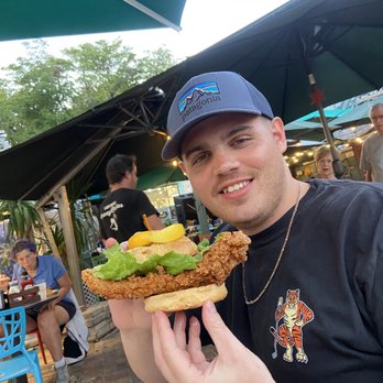 Caroline's - Famous fish sandwich, it was HUGE and my husband loved it! - American Near Me - Key West, Florida Caroline's - Famous fish sandwich, it was HUGE and my husband loved it! - American Near Me - Key West, Florida