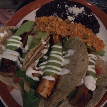 Jose and Sons - Fish of the day tacos with rice and beans. Yummy! And great idea with the double tortilla to make it easier to eat... - New American Near Me - Raleigh, North Carolina