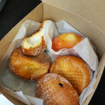 Leonard's Bakery - Half eaten haupia. Best when eaten warm! - Bakeries Near Me - Honolulu, Hawaii Leonard's Bakery - Half eaten haupia. Best when eaten warm! - Bakeries Near Me - Honolulu, Hawaii