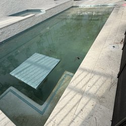 Premier Pools & Spas - Dirty pool as no cleaning company will touch this pool with a 10 foot pole because it's incomplete