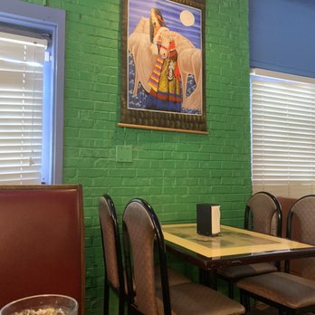 China Buffet - a table and chairs in a chinese restaurant - Chinese Near Me - Florence, South Carolina
