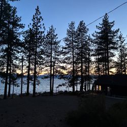 Galilee Episcopal Camp and Conference Center - Stunning sunset through the trees on Lake Tahoe.