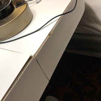 Hampton Inn St. Joseph - Peeling laminate on nightstand - Hotels Near Me - Saint Joseph, Missouri