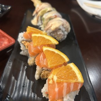 Sake 2 Me Sushi - a sushi with salmon and orange slices - Sushi Bars Near Me - Simi Valley, California Sake 2 Me Sushi - a sushi with salmon and orange slices - Sushi Bars Near Me - Simi Valley, California