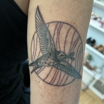 Black Heart Tattoo - Barn swallow holding two flowers - Tattoo Near Me - San Francisco, California Black Heart Tattoo - Barn swallow holding two flowers - Tattoo Near Me - San Francisco, California