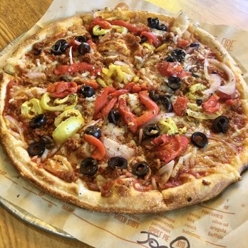 Blaze Pizza - Vegan cheese and vegan chorizo on regular crust - Pizza Near Me - Orlando, Florida Blaze Pizza - Vegan cheese and vegan chorizo on regular crust - Pizza Near Me - Orlando, Florida