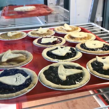 Pie Jacked - Several "Cutie" (single-serve) sized pies, with a larger pie in the background. - Gluten-Free Near Me - Round Rock, Texas