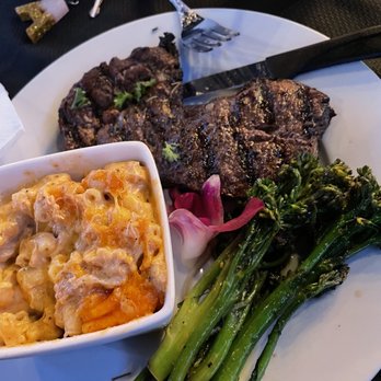 Legacy Resturant & Lounge - Da Don Ribeye with Seafood Krack N Cheese and Broccolini - Lounges Near Me - Jacksonville, Florida Legacy Resturant & Lounge - Da Don Ribeye with Seafood Krack N Cheese and Broccolini - Lounges Near Me - Jacksonville, Florida