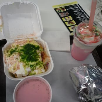 Bollywood Unlimited - Clockwire from top left:  Chaat Papri, Shaahi Falooda, Paneer Tikka Burger (wrapped), & Kashmiri Tea - Cinema Near Me - Mississauga, Ontario
