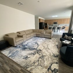 Brick And Mortarless Furniture - Omnia custom leather sectional. Amisco swivel chairs.