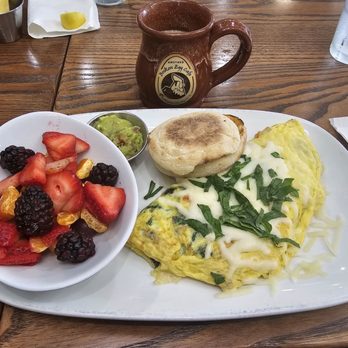 Another Broken Egg Cafe - Veggie omelet with berries and English muffin. - Breakfast & Brunch Near Me - Panama City Beach, Florida Another Broken Egg Cafe - Veggie omelet with berries and English muffin. - Breakfast & Brunch Near Me - Panama City Beach, Florida