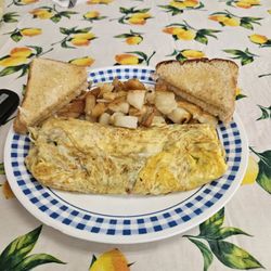 Auto Mile Diner - Western omelet,  home fries and toast. All dome perfect.