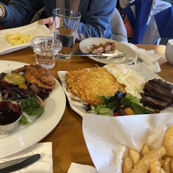 Brunchbar - Steak and egg, half eaten chicken and waffle - Breakfast & Brunch Near Me - Bellevue, Washington