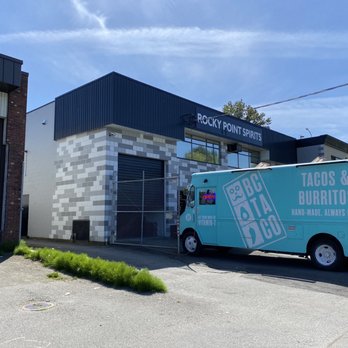 Rocky Point Spirits - a truck parked in front of a building - Breweries Near Me - Port Moody, British Columbia Rocky Point Spirits - a truck parked in front of a building - Breweries Near Me - Port Moody, British Columbia
