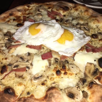 Carroll Place - Eggs, truffle cream & speck pizza! - Italian Near Me - New York, New York Carroll Place - Eggs, truffle cream & speck pizza! - Italian Near Me - New York, New York