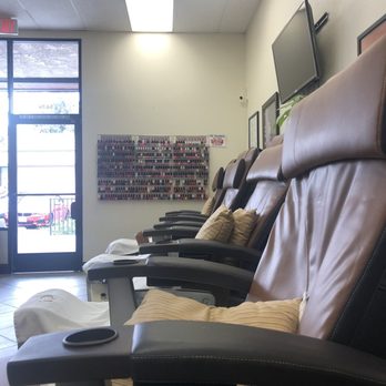 Affection Nails - The spa chairs that massage your back-you pick the speed, type, time. And on the wall-Polish Color Options - Nail Salons Near Me - Agoura Hills, California
