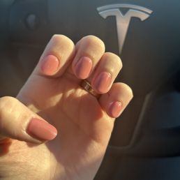 Dip on natural nail; round shape (taken about a week after service).