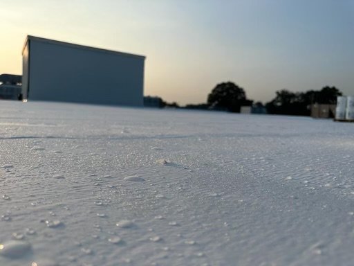 Slide of RainTight Roofing & Construction