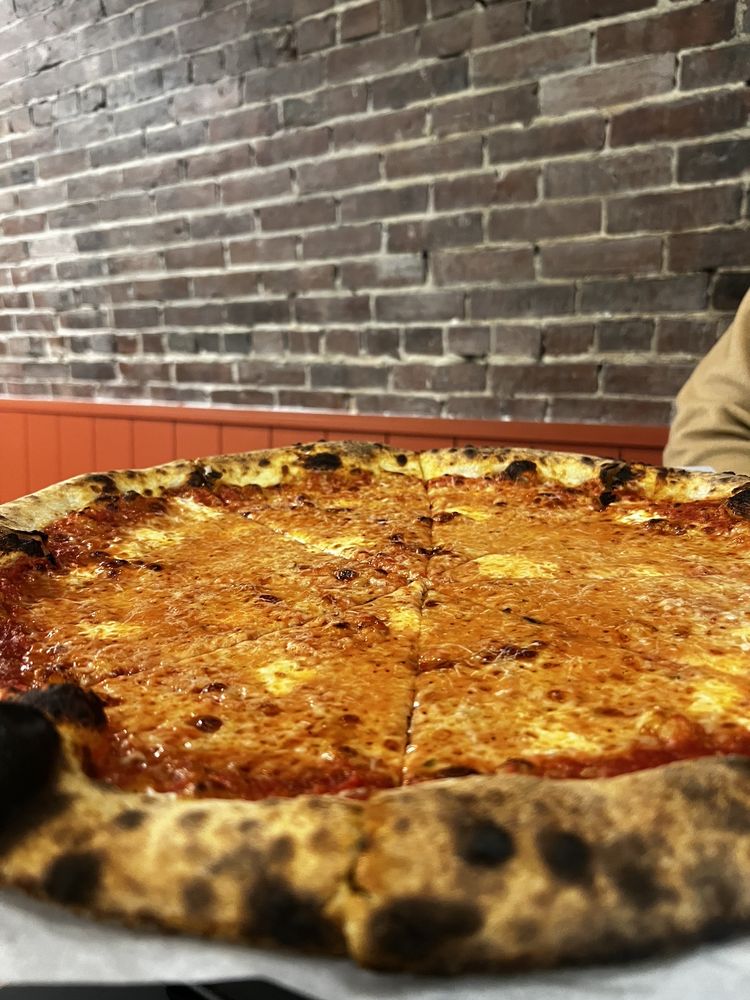 Food from Peng’s Pizza Pies
