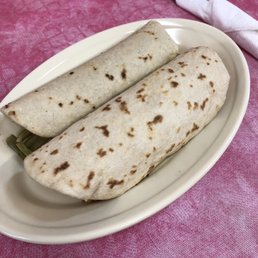 Breakfast tacos : the world's best flour tortillas stuffed with chorizo and eggs and nopalitos Breakfast tacos : the world's best flour tortillas stuffed with chorizo and eggs and nopalitos