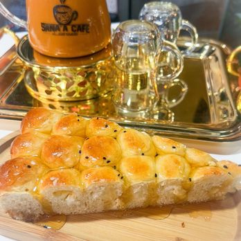 Sana'a Cafe - Cream Cheese Honey Comb - Coffee & Tea Near Me - Lake Forest, California Sana'a Cafe - Cream Cheese Honey Comb - Coffee & Tea Near Me - Lake Forest, California