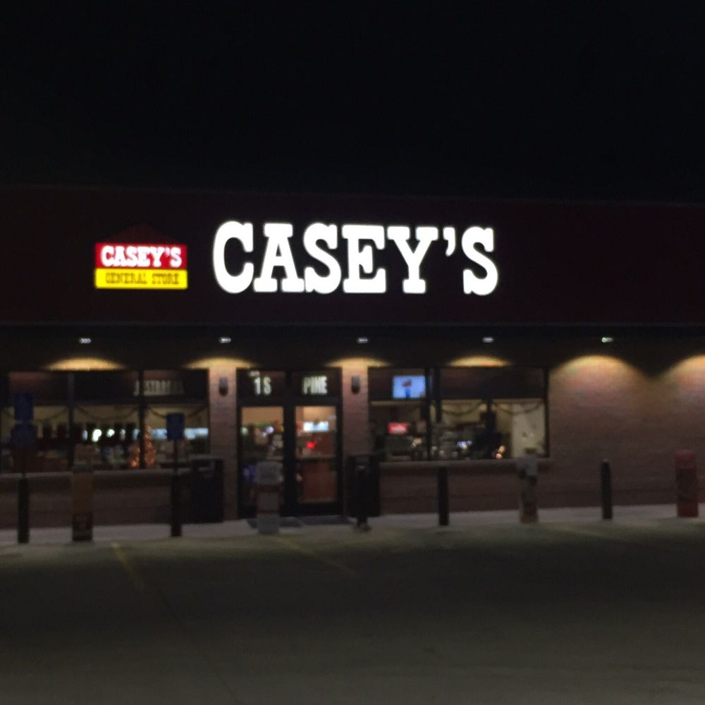 Casey's - the front of a restaurant at night - Pizza Near Me - Circle Pines, Minnesota