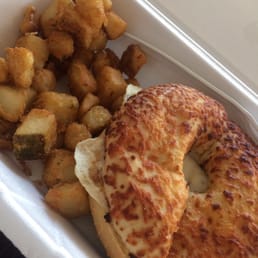 Bacon, egg, and cheese on an Asiago bagel and delicious homefries! Bacon, egg, and cheese on an Asiago bagel and delicious homefries!