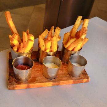 Bourbon Steak Orange County - Complimentary fries fried in duck fat with ketchup, black truffle aoli and dill pickle dipping sauce! - Steakhouses Near Me - Dana Point, California