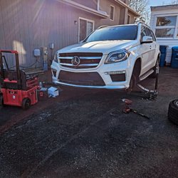 Ralphs Auto Service - 2015 mercedes gl63 amg getting new front pads and rotors installed.