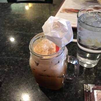 Thai Spices - Thai iced tea with a paper Rose made from the straw wrapper. - Thai Near Me - Mesa, Arizona Thai Spices - Thai iced tea with a paper Rose made from the straw wrapper. - Thai Near Me - Mesa, Arizona