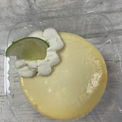 Trish's Specialty  Cheese Cakes - Key lime cheesecake, With delectible homemade whipped cream, with a slice of lime.