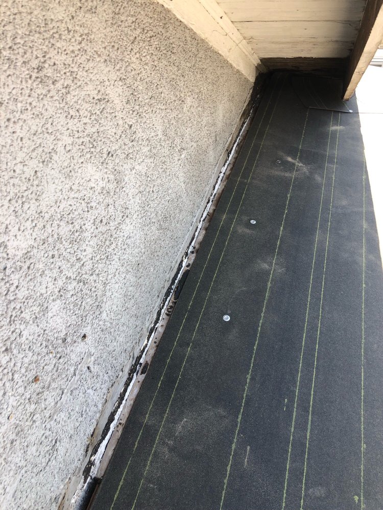 Slide of Kennedy Roofing