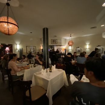 Das Ethiopian - a group of people sitting at tables in a restaurant - Ethiopian Near Me - Washington, DC, District of Columbia