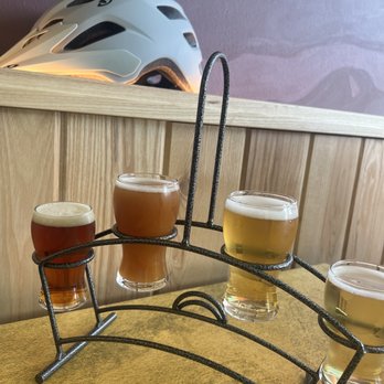 Herbiery - four glasses of beer and a helmet - Breweries Near Me - Madison, Wisconsin Herbiery - four glasses of beer and a helmet - Breweries Near Me - Madison, Wisconsin