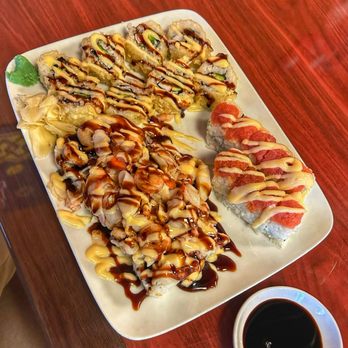 Carolina Sushi & Roll - a plate of sushi and a cup of coffee - Japanese Near Me - Raleigh, North Carolina Carolina Sushi & Roll - a plate of sushi and a cup of coffee - Japanese Near Me - Raleigh, North Carolina