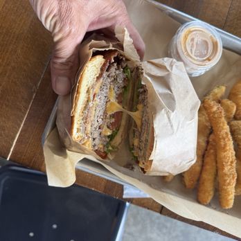 Hen & Heifer - The narcissist double cheeseburger with bacon Half order of onion rings, half order of fried zucchini - American Near Me - Pomona, California