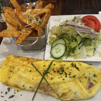 Next Door Beach Bistro - Omelette and fries - Seafood Near Me - Flagler Beach, Florida Next Door Beach Bistro - Omelette and fries - Seafood Near Me - Flagler Beach, Florida