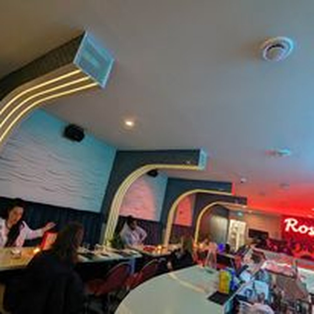 Rosa's - diners at tables in a restaurant - Latin American Near Me - Toronto, Ontario Rosa's - diners at tables in a restaurant - Latin American Near Me - Toronto, Ontario