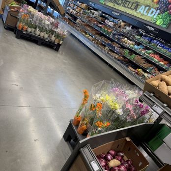 ALDI - Some random dealer's junk flowers now occupy what used to be quality produce. - Grocery Near Me - Coachella, California ALDI - Some random dealer's junk flowers now occupy what used to be quality produce. - Grocery Near Me - Coachella, California