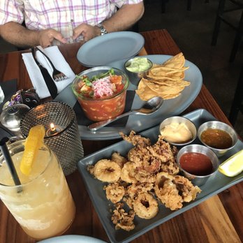 Pearl Tavern - Seafood ceviche and calamari with a refreshing bourbon spritzer - New American Near Me - Lee's Summit, Missouri Pearl Tavern - Seafood ceviche and calamari with a refreshing bourbon spritzer - New American Near Me - Lee's Summit, Missouri