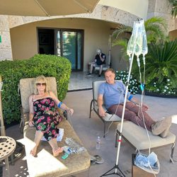 Finishline IV Hydration - Clients receiving IVs around a hotel pool