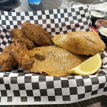 Nad's Chicken & Seafood - Fried Tilapia and wings meal. Cajun hot dry rub on the breaded wings - Chicken Wings Near Me - Tempe, Arizona Nad's Chicken & Seafood - Fried Tilapia and wings meal. Cajun hot dry rub on the breaded wings - Chicken Wings Near Me - Tempe, Arizona