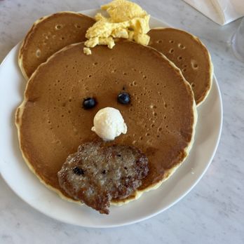 The Village Inn - Funny Face Kid's Meal with scrambled eggs and sausage patty. - Creperies Near Me - Omaha, Nebraska
