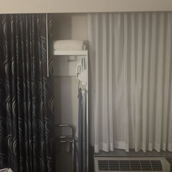 Hampton Inn Seattle-Airport - Closet hidden behind curtain. - Hotels Near Me - Seattle, Washington Hampton Inn Seattle-Airport - Closet hidden behind curtain. - Hotels Near Me - Seattle, Washington